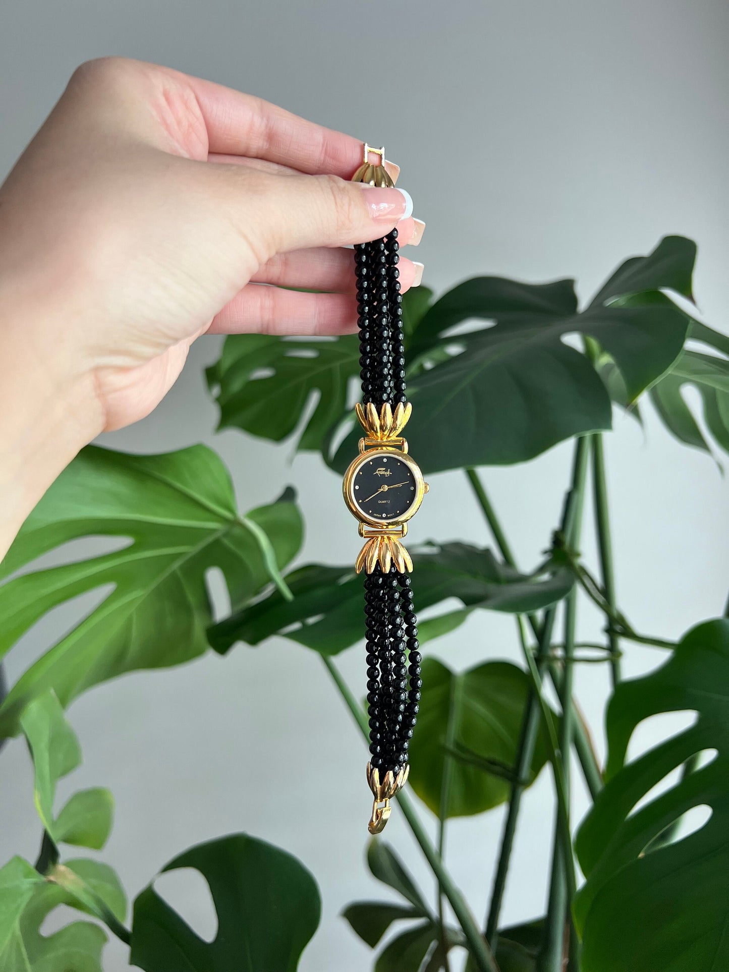 Vintage Faberge Women’s Watch | Round Black Dial | Gold Tone | Beaded Black Band | NON-WORKING